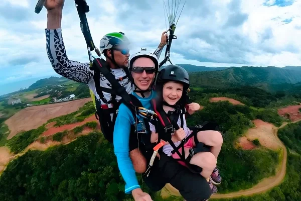 View of a family during a Jaco Paragliding Tour in the air